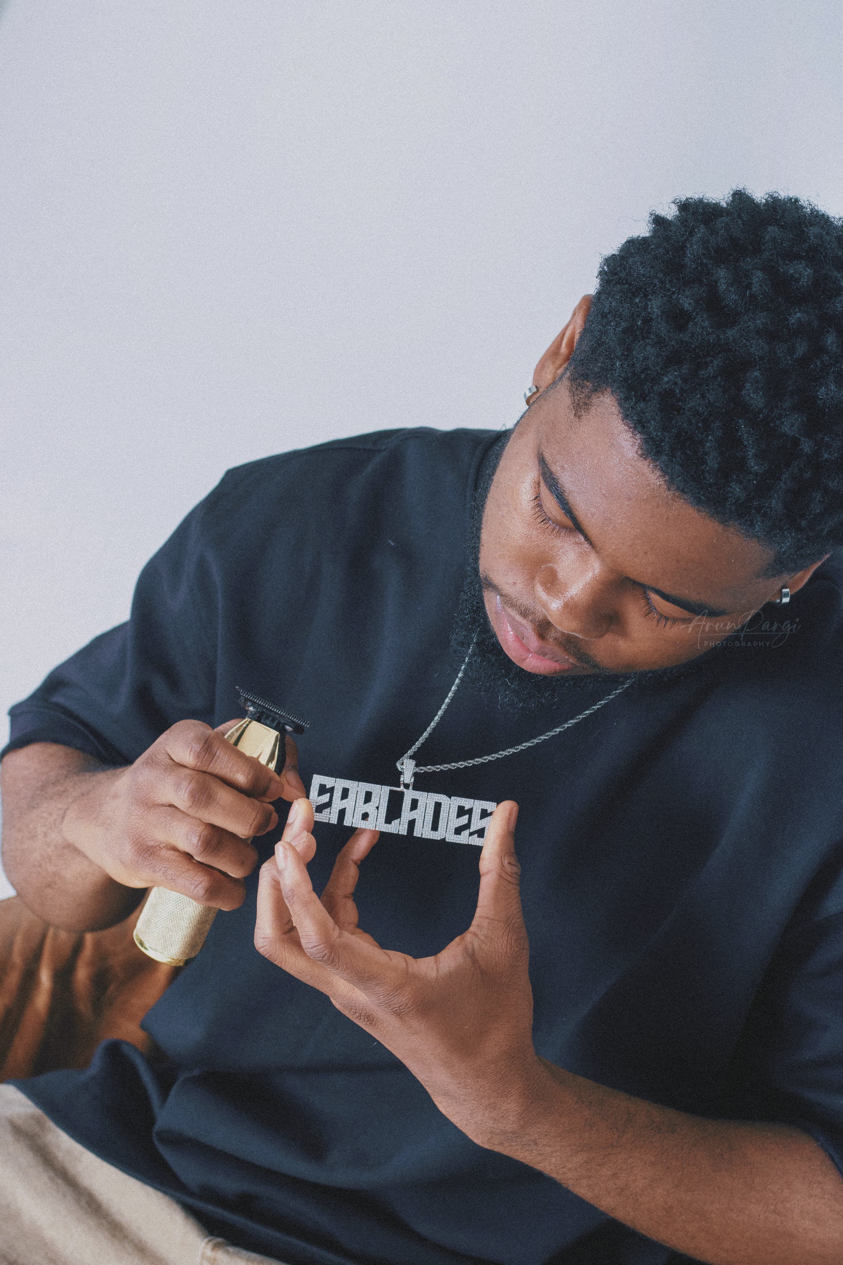 Emmanuel Adjei, black barber and founder of EA Blades